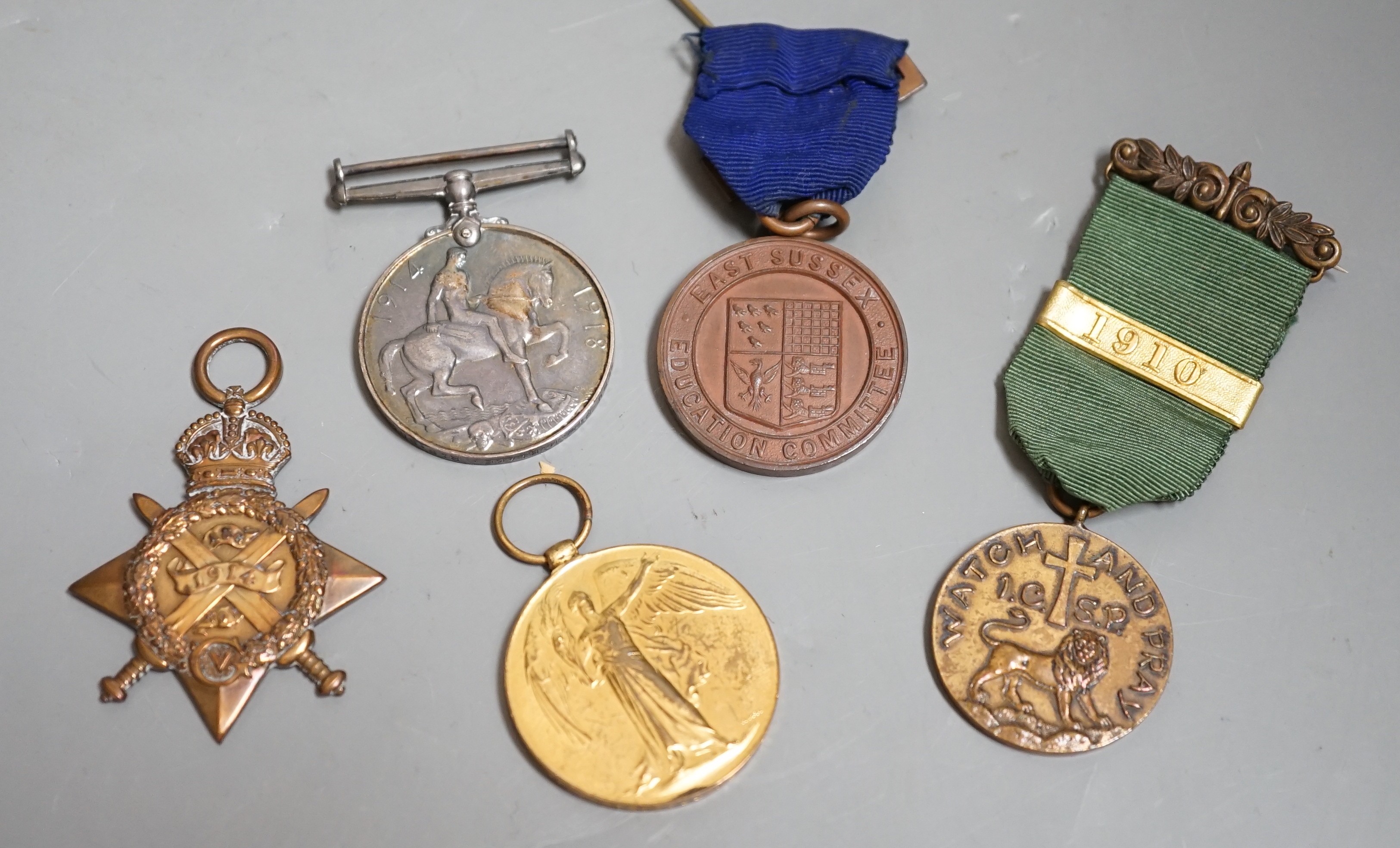 A group of various medals, to include a British Star awarded to R. Blake, two WWI medals, an incorporated patrols church scout medal, and an East Sussex Education Committee, (5)